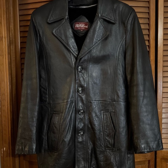 designer international Black Leather Coat with Vintage Appeal